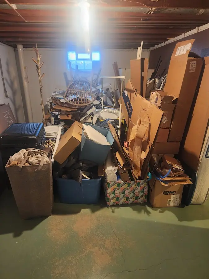 Roll-off dumpster container at job site for 8 Yard Dumpster Rental in Mauston